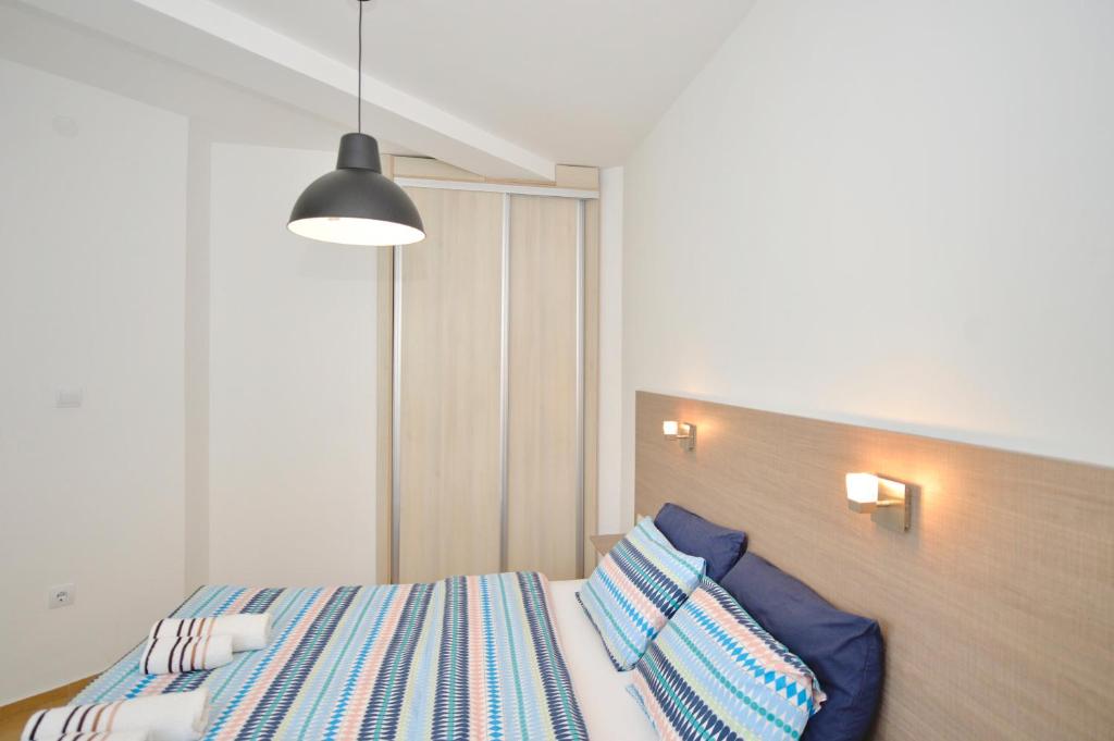 Krevet ili kreveti u jedinici u okviru objekta Apartments Kriva Ulica