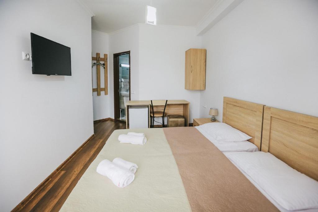 Postel nebo postele na pokoji v ubytování Balanchine