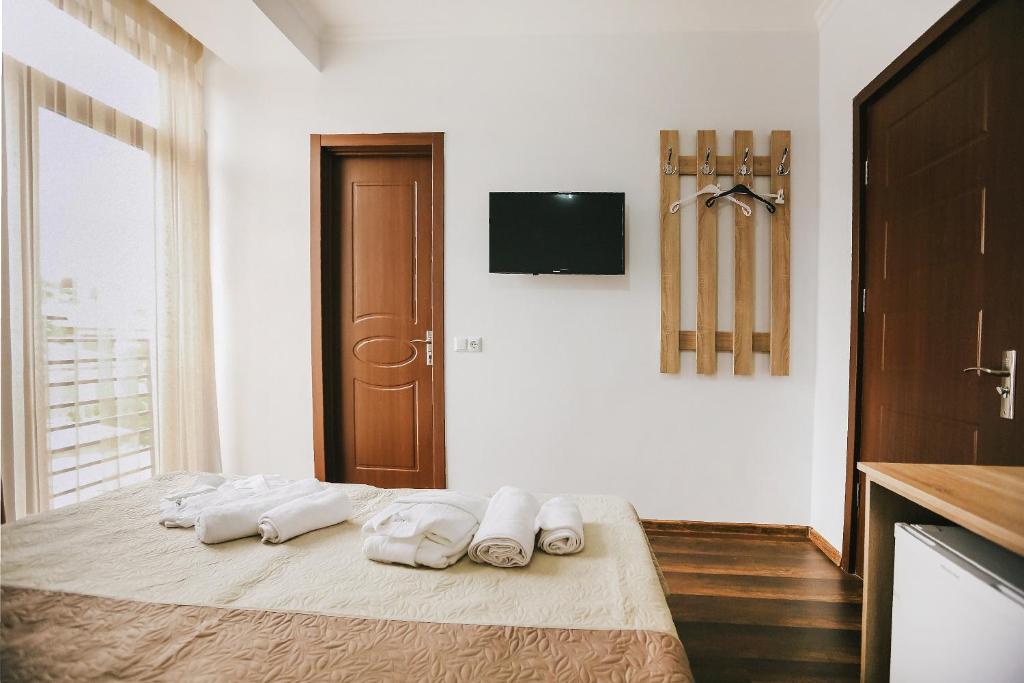 Postel nebo postele na pokoji v ubytování Balanchine