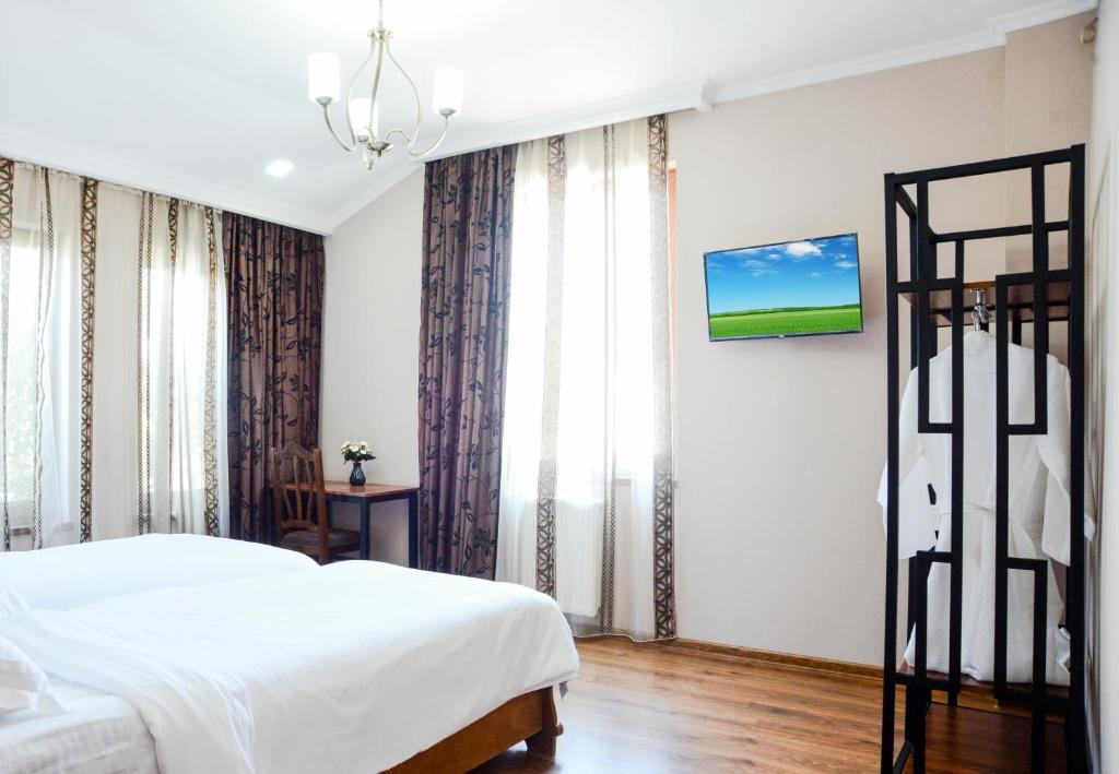 Postel nebo postele na pokoji v ubytování Bellis