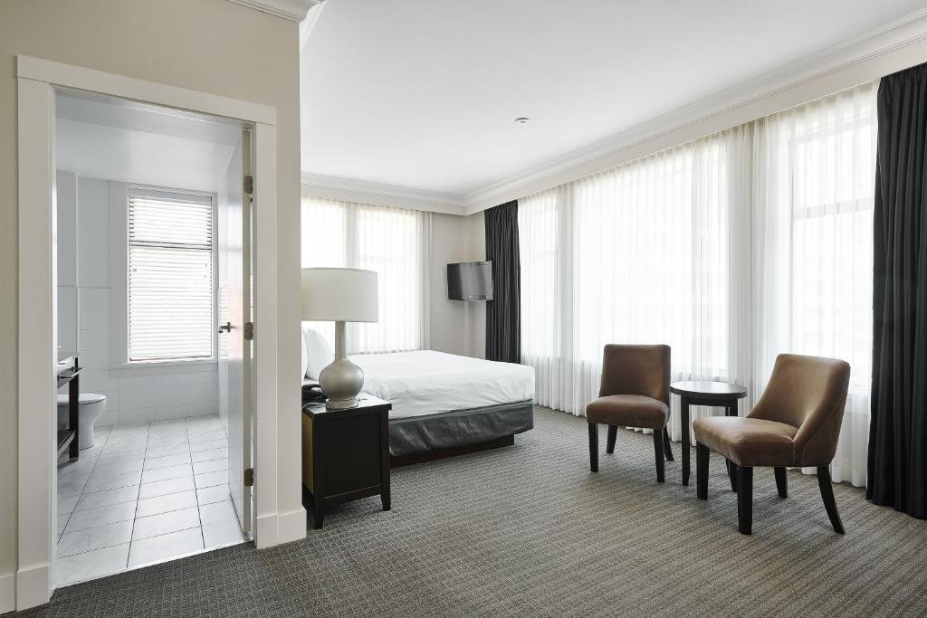 Postel nebo postele na pokoji v ubytování Hotel Rialto