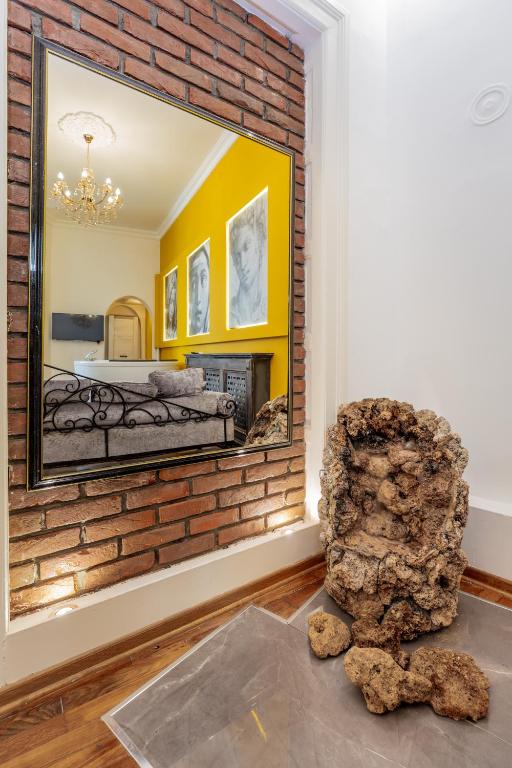Postel nebo postele na pokoji v ubytování Ben Akiba Luxury Suites