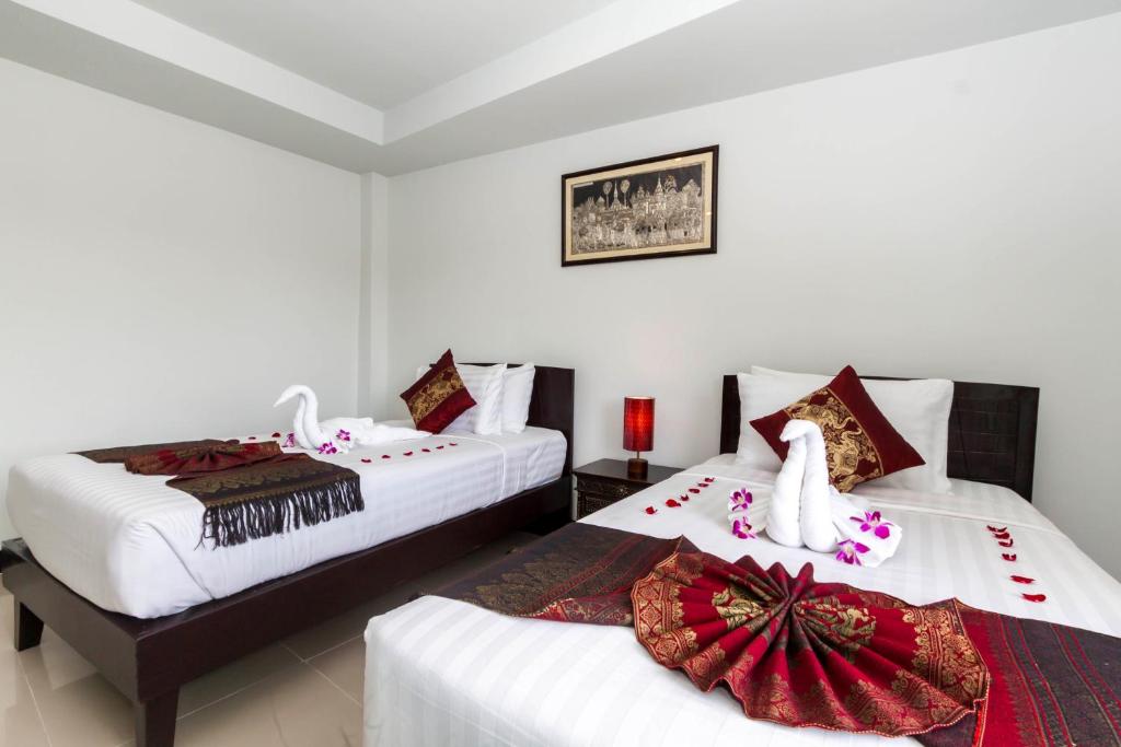 Postel nebo postele na pokoji v ubytování Silver Resortel