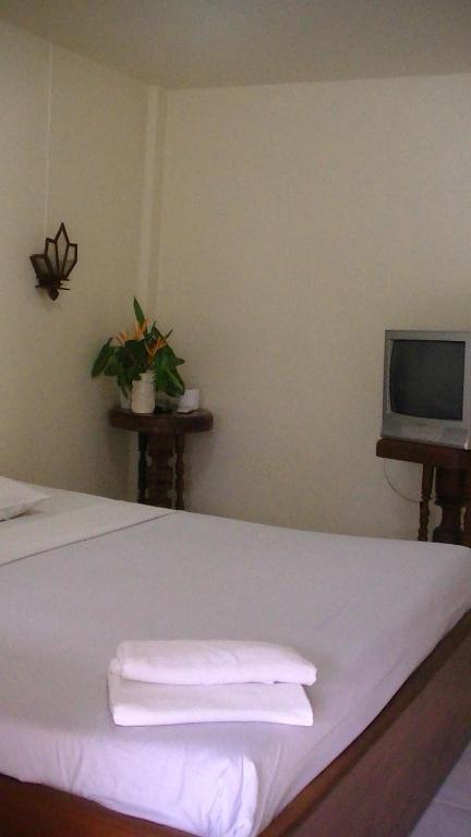 Postel nebo postele na pokoji v ubytování Utopia Resort