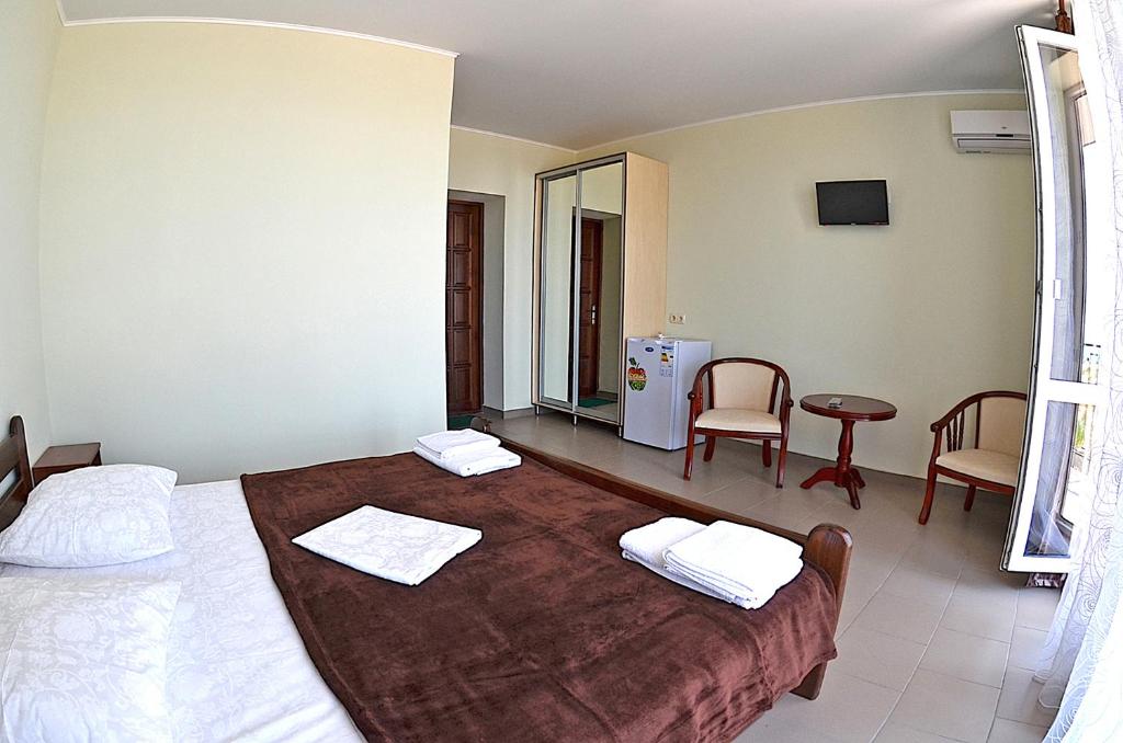 Postel nebo postele na pokoji v ubytování Hotel Golden Beach