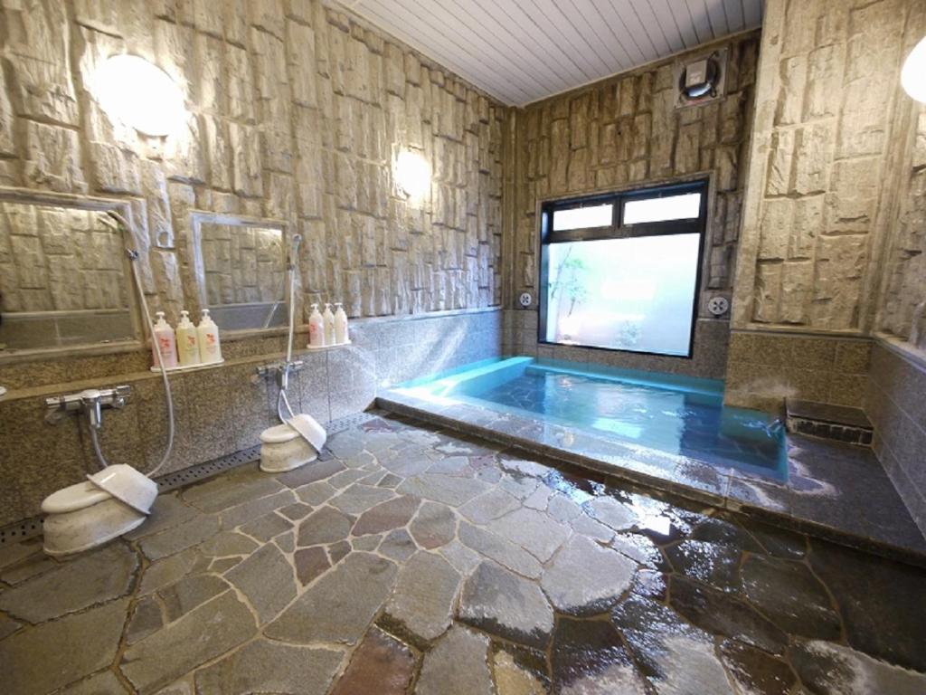 Koupelna v ubytování Hotel Route-Inn Shimada Ekimae
