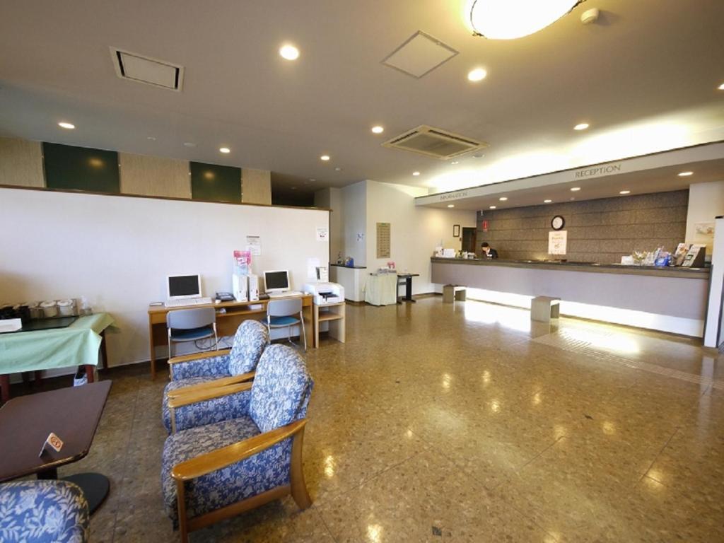 TV a/nebo společenská místnost v ubytování Hotel Route-Inn Shimada Ekimae