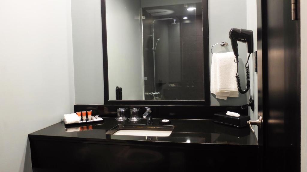 Koupelna v ubytování Amelie Hotel Manila