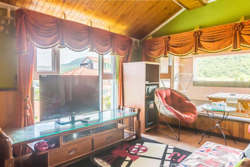 TV a/nebo společenská místnost v ubytování Kenting Maya-House B&B