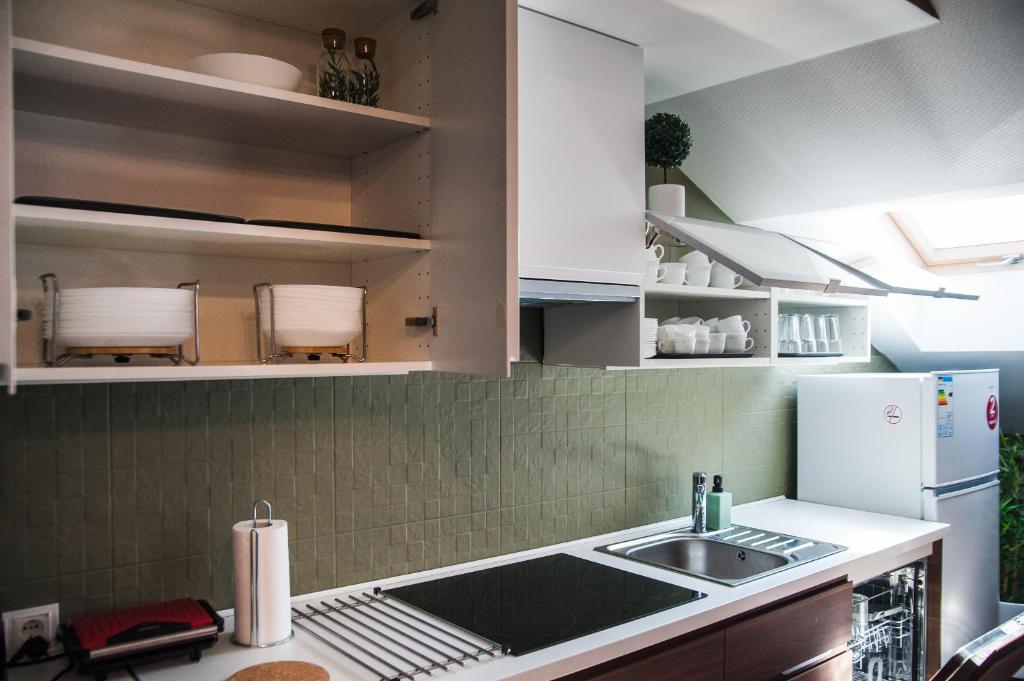 Kuchyň nebo kuchyňský kout v ubytování VALIZA HOSTEL