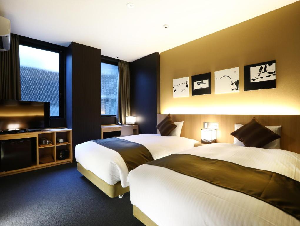 Postel nebo postele na pokoji v ubytování Hotel Wing International Kyoto - Shijo Karasuma