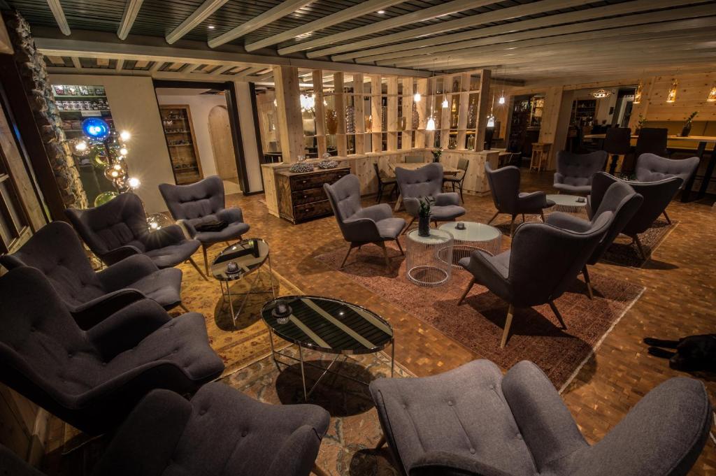 Posezení v ubytování Hotel Ciasa Salares