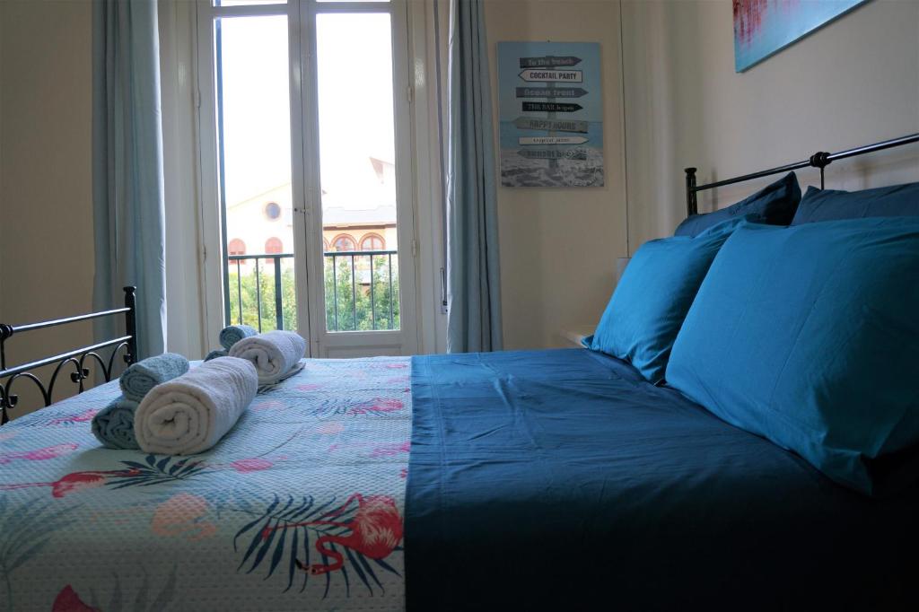 Posteľ alebo postele v izbe v ubytovaní La Rò-tonda apartment