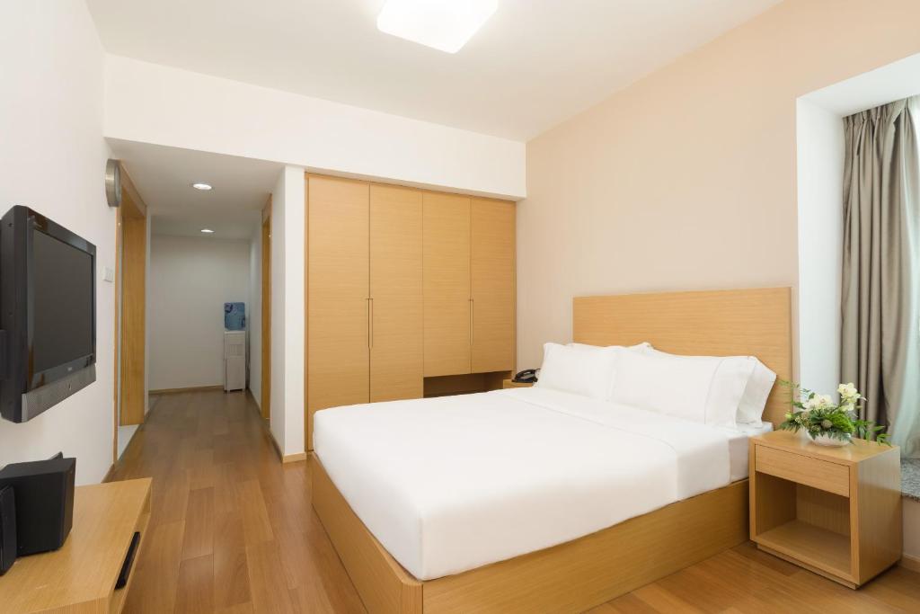 TV a/nebo společenská místnost v ubytování 广州友和酒店Yuwa Hotel-Free Shuttle Bus to Canton Fair Complex DuringCanton Fair Period