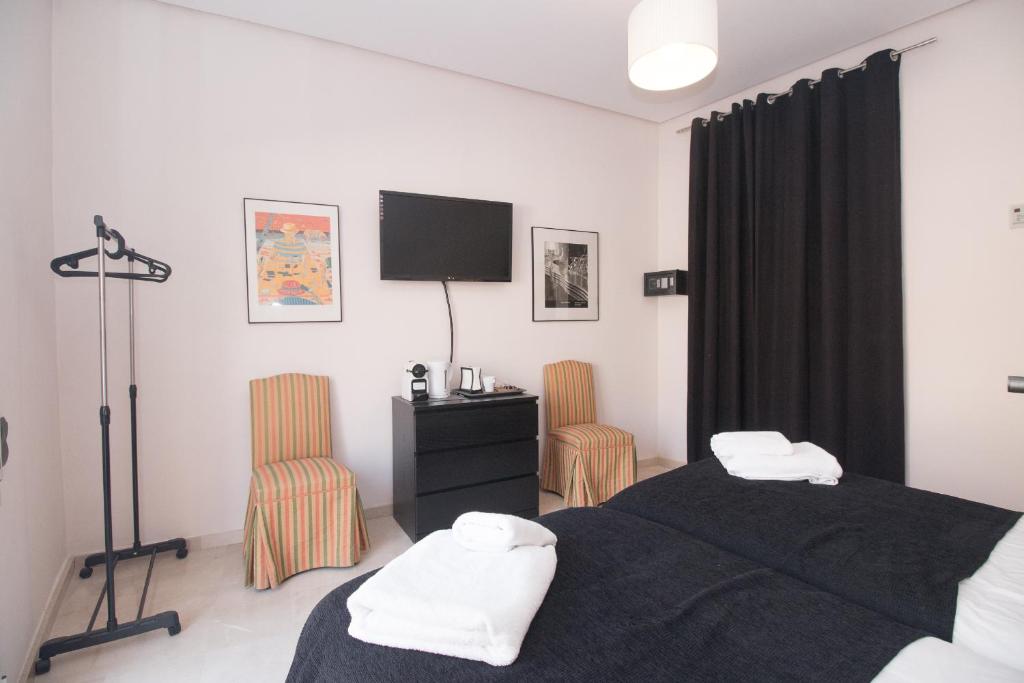 Postel nebo postele na pokoji v ubytování BET Apartments - Canovas rooms