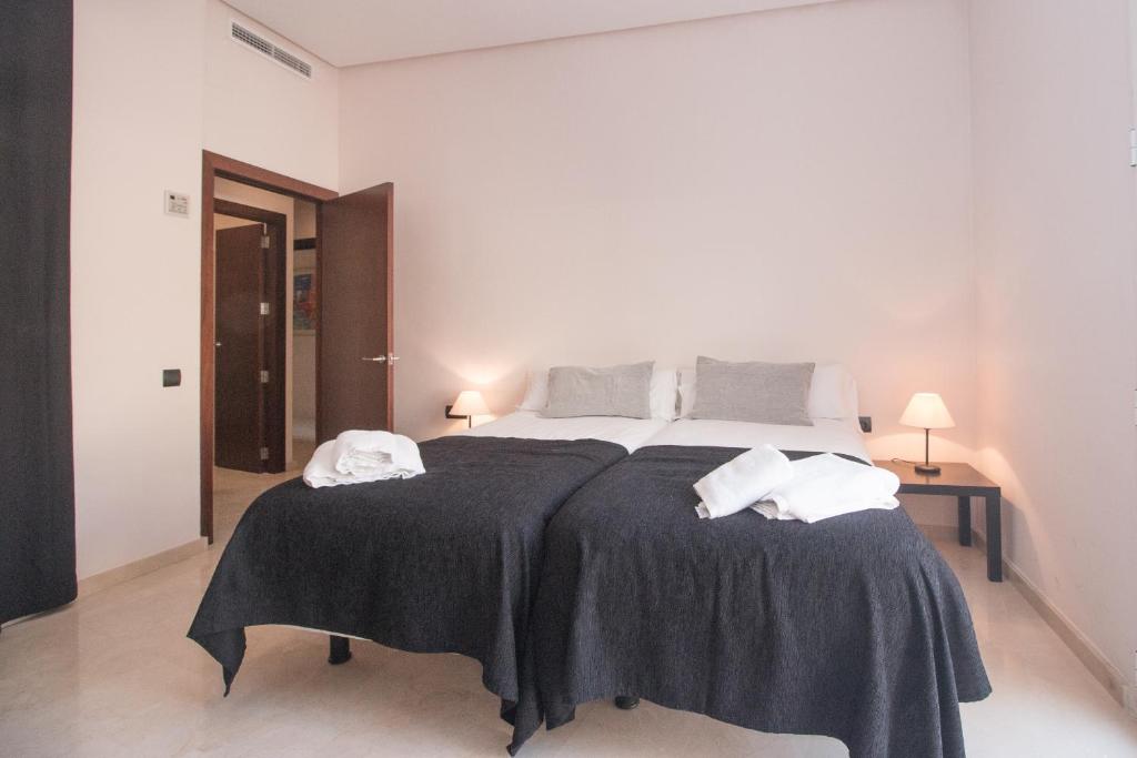 Postel nebo postele na pokoji v ubytování BET Apartments - Canovas rooms