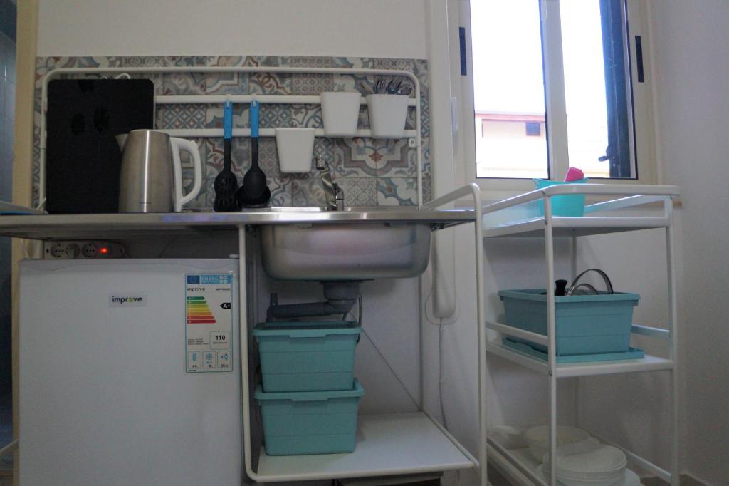 Kuchyňa alebo kuchynka v ubytovaní La Rò-tonda apartment