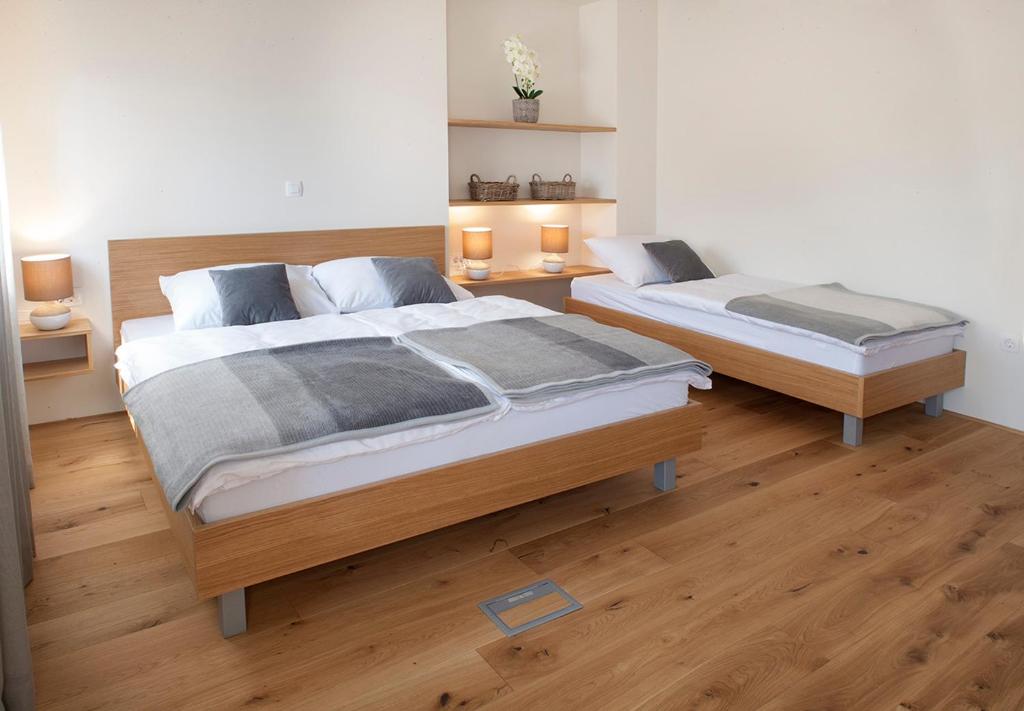 Postel nebo postele na pokoji v ubytování Guesthouse Turšič