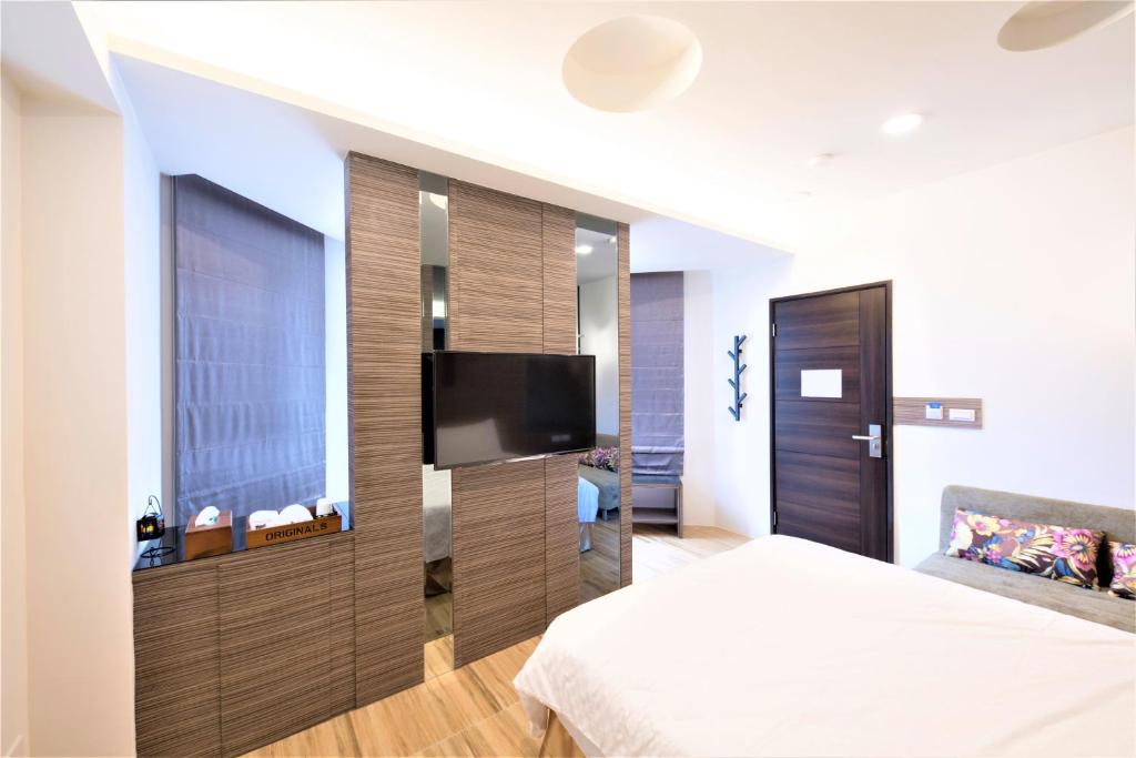 TV a/nebo společenská místnost v ubytování 晴空桂冠 Clear Sky Laurel Hotel