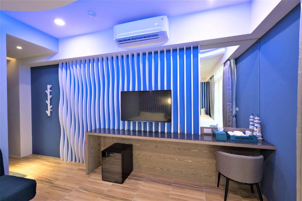 TV a/nebo společenská místnost v ubytování 晴空桂冠 Clear Sky Laurel Hotel