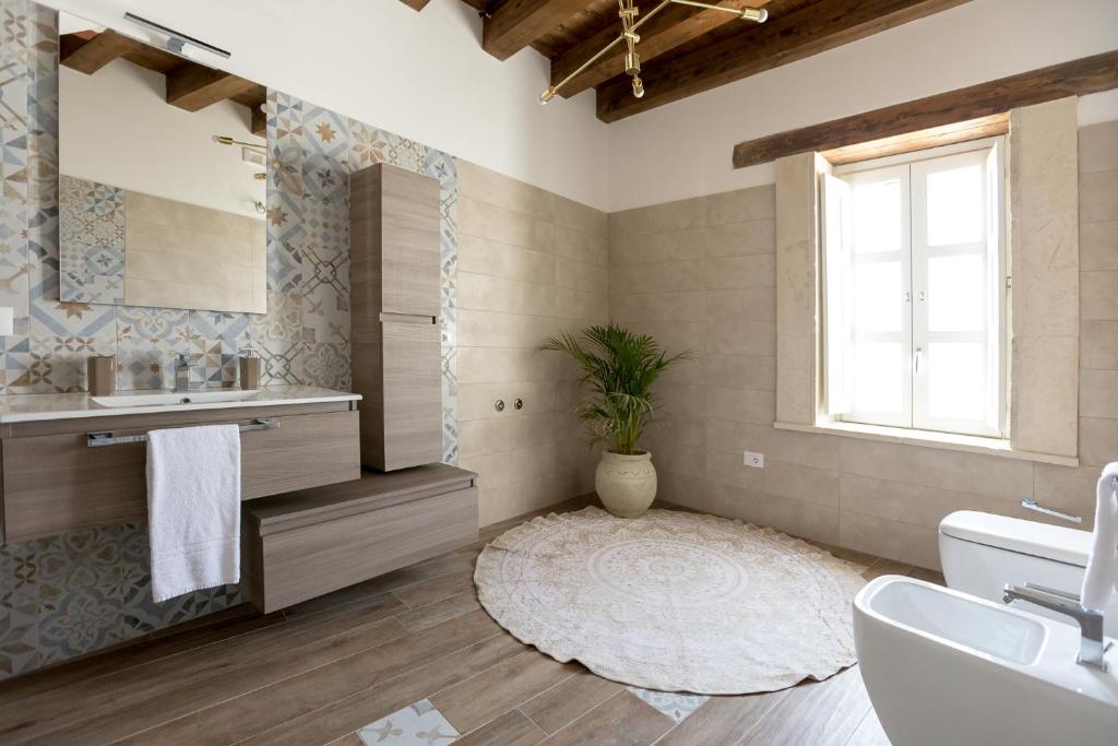 Kúpeľňa v ubytovaní Ortigia Boutique Palace