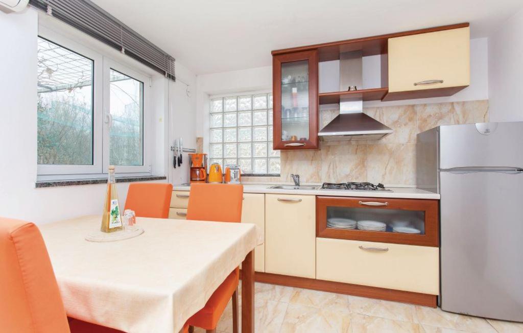 Kuchyň nebo kuchyňský kout v ubytování Molnar Resort Apartment Sergej