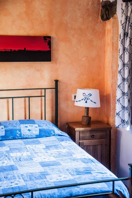 Postel nebo postele na pokoji v ubytování Dimora nel Chianti