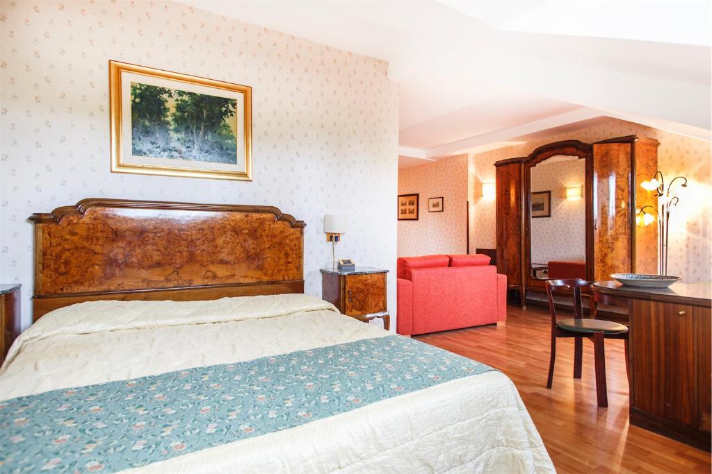 Posteľ alebo postele v izbe v ubytovaní Colleverde Park Hotel