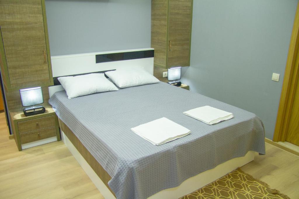 Postel nebo postele na pokoji v ubytování Batumi Hotel R&M