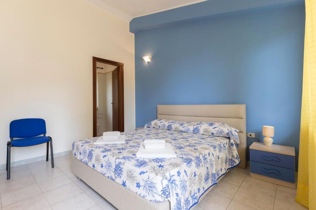 Postel nebo postele na pokoji v ubytování Borgo San Cosmo Tropea