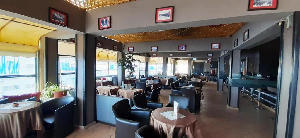 Posezení v ubytování New Farah Hotel