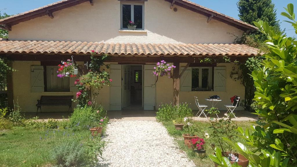 a small house with a pathway leading to it at Holiday Country Villa with Panoramic Views in Bouteilles-Saint-Sébastien