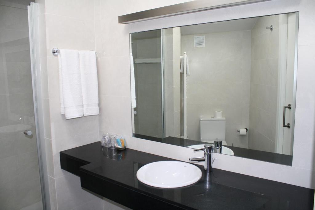 Kúpeľňa v ubytovaní Hostal Tres Campanas