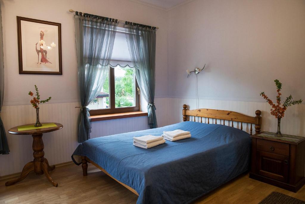 Katil atau katil-katil dalam bilik di Veski Guesthouse