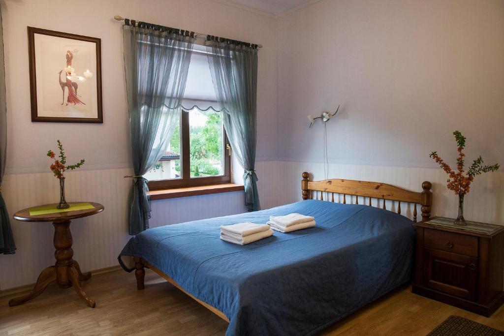 Postel nebo postele na pokoji v ubytování Veski Guesthouse