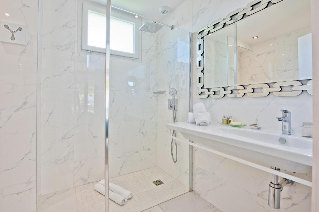 Ванная комната в Hôtel La Villa Cap d’Antibes