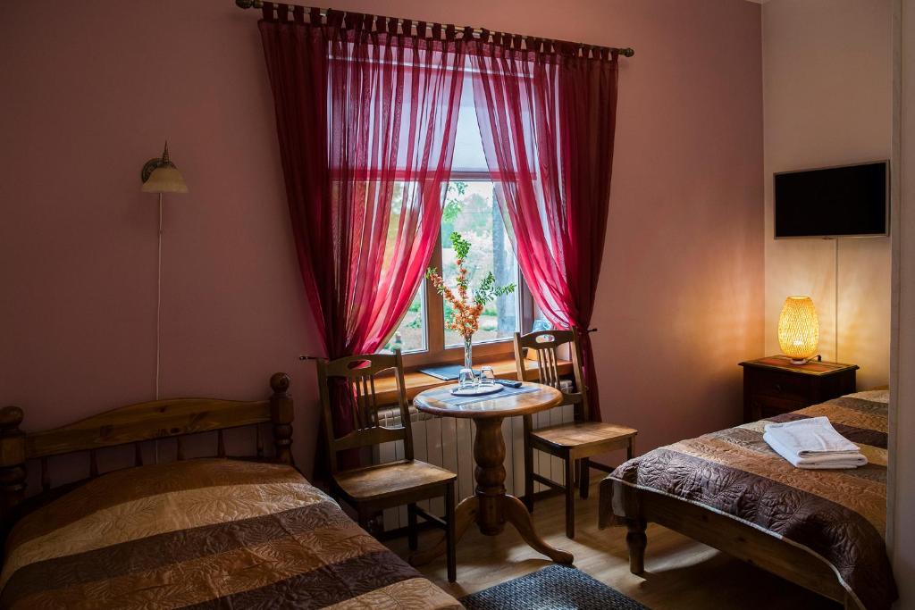 Postel nebo postele na pokoji v ubytování Veski Guesthouse