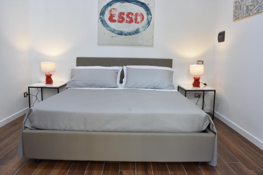 Postel nebo postele na pokoji v ubytování b&b Donna Raffaela