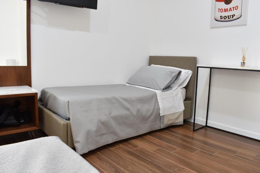 Postel nebo postele na pokoji v ubytování b&b Donna Raffaela