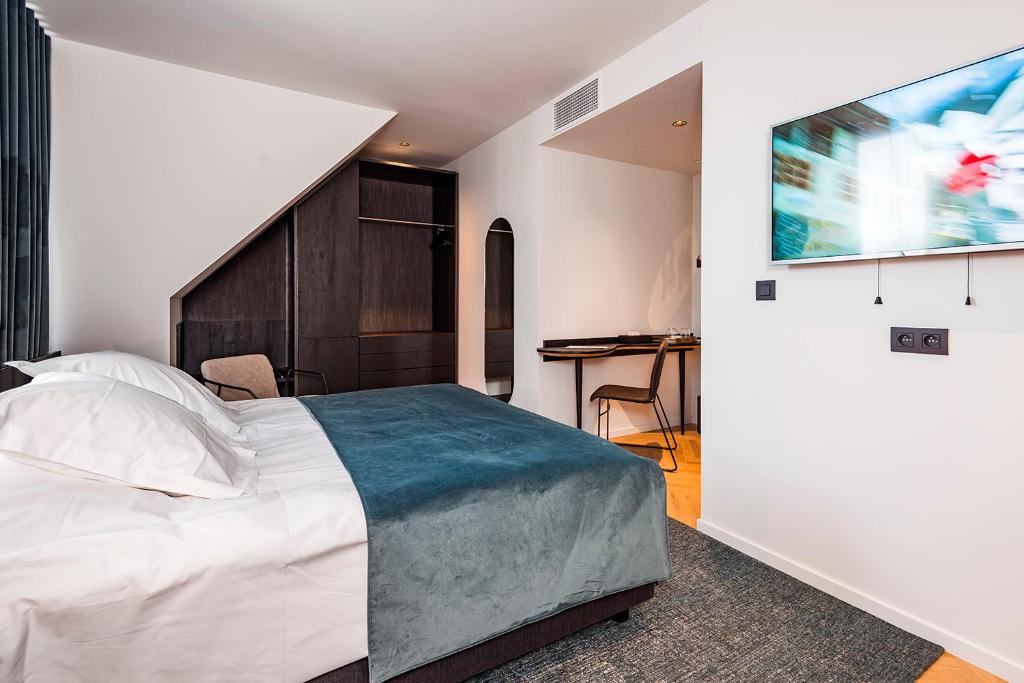 Postel nebo postele na pokoji v ubytování Designhotel Beila
