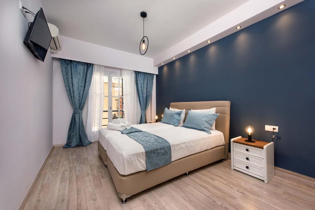 Postel nebo postele na pokoji v ubytování Mezza Volta Corfu by Estia