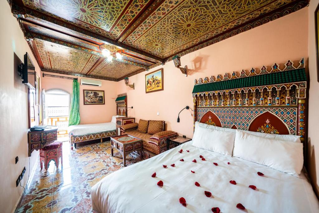 Postel nebo postele na pokoji v ubytování Moroccan House