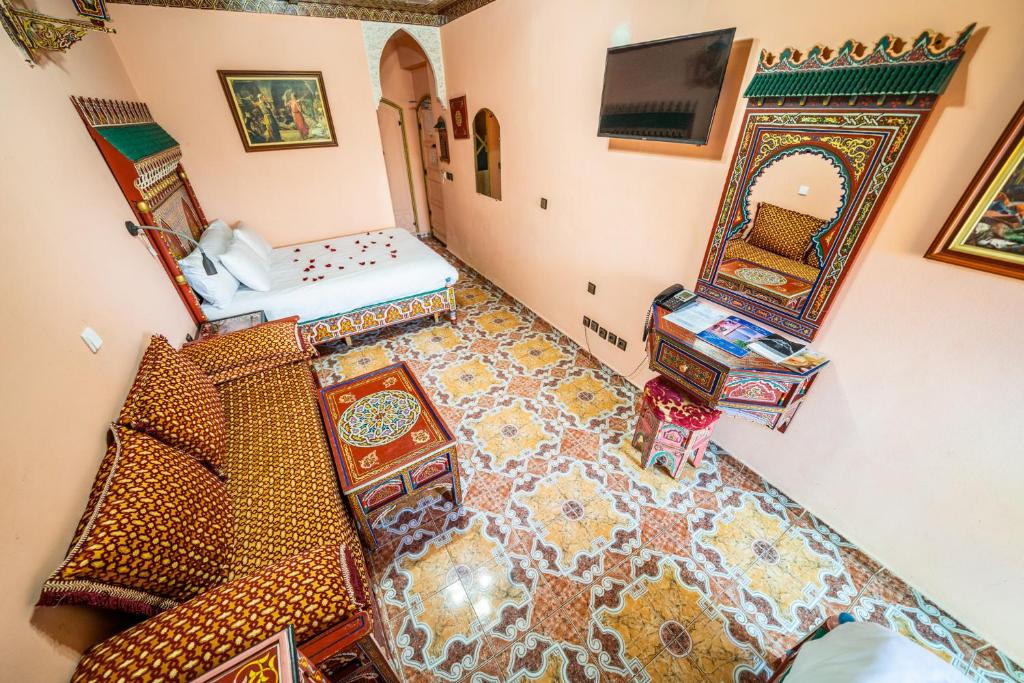 TV a/nebo společenská místnost v ubytování Moroccan House