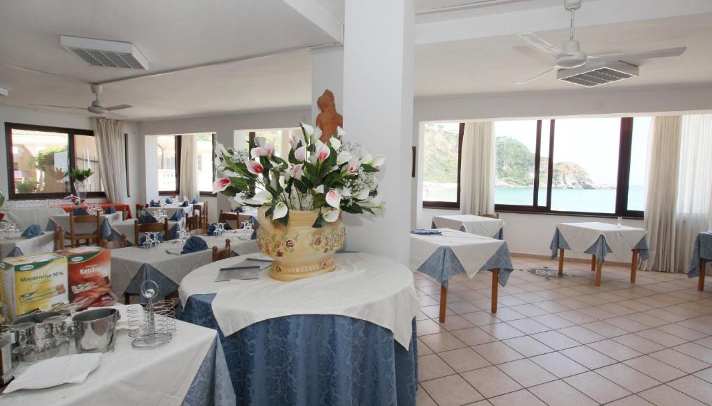 Restaurace v ubytování Villaggio Quattro Scogli