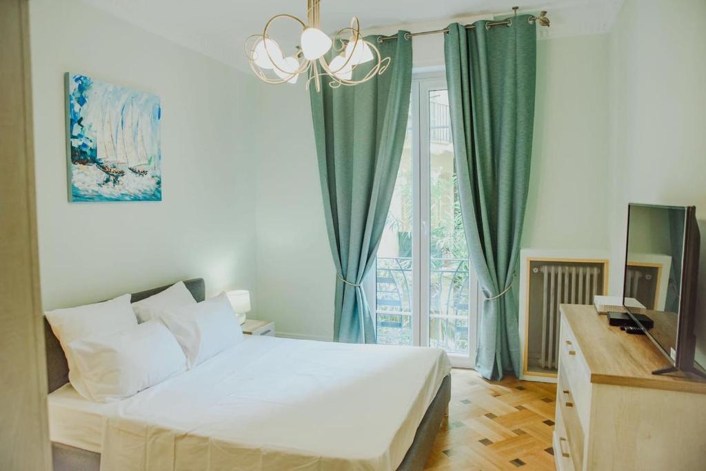 En eller flere senge i et værelse på AzurAppart 2-room Super centre Nice
