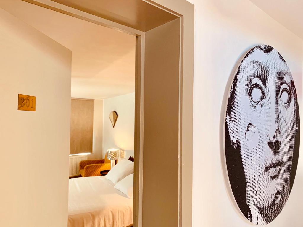 Postel nebo postele na pokoji v ubytování B&B Belle de Nuit