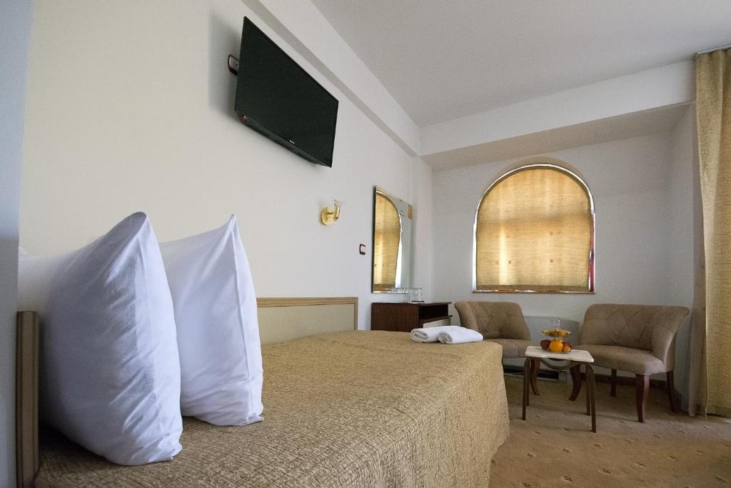 Postel nebo postele na pokoji v ubytování Hotel Nar Gevgelija