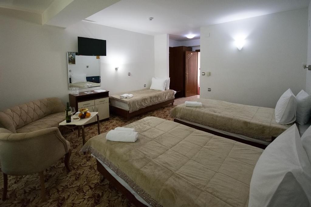 Postel nebo postele na pokoji v ubytování Hotel Nar Gevgelija