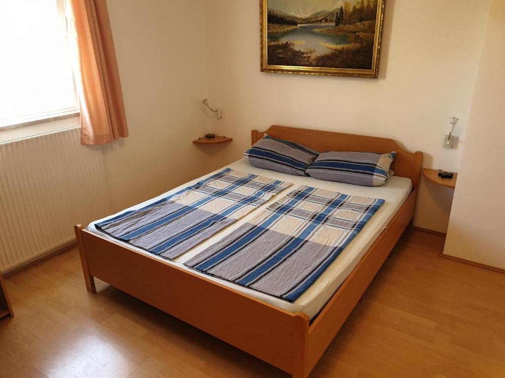 Postel nebo postele na pokoji v ubytování Apartmenthaus Fa