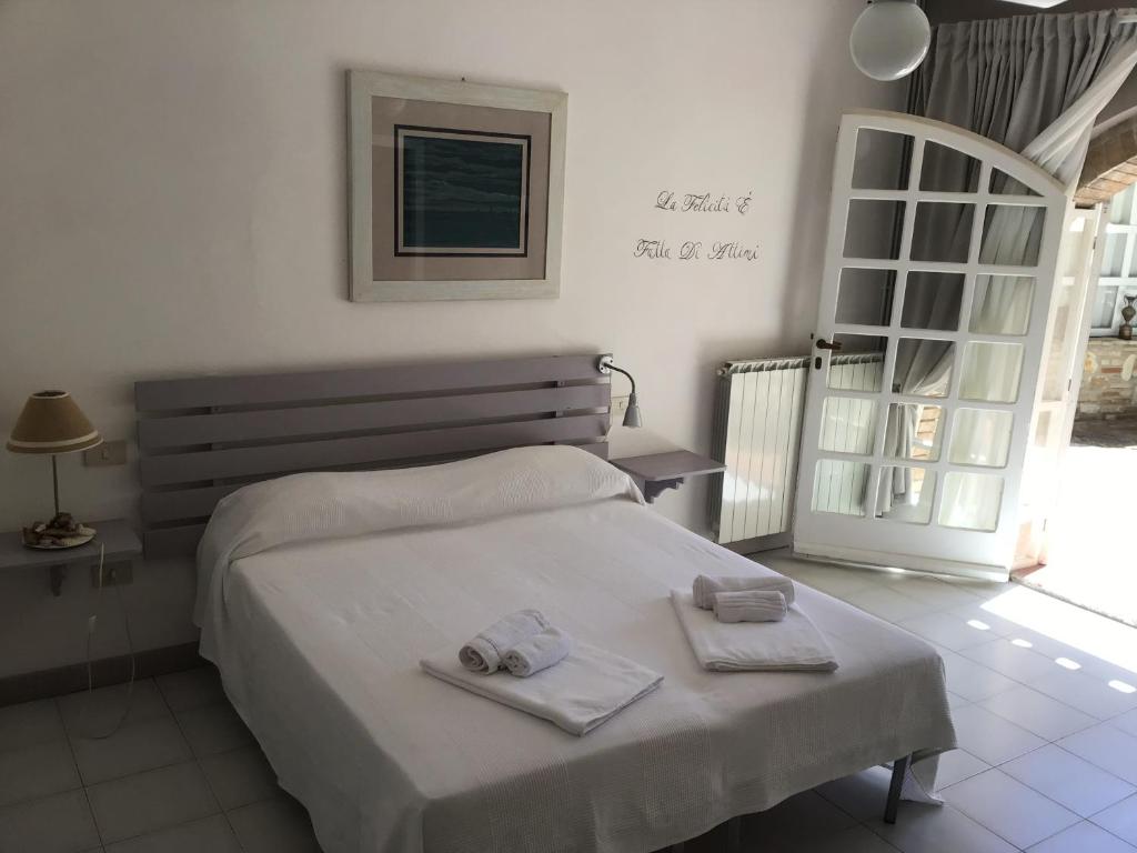 Postel nebo postele na pokoji v ubytování Villa Ghirardelli